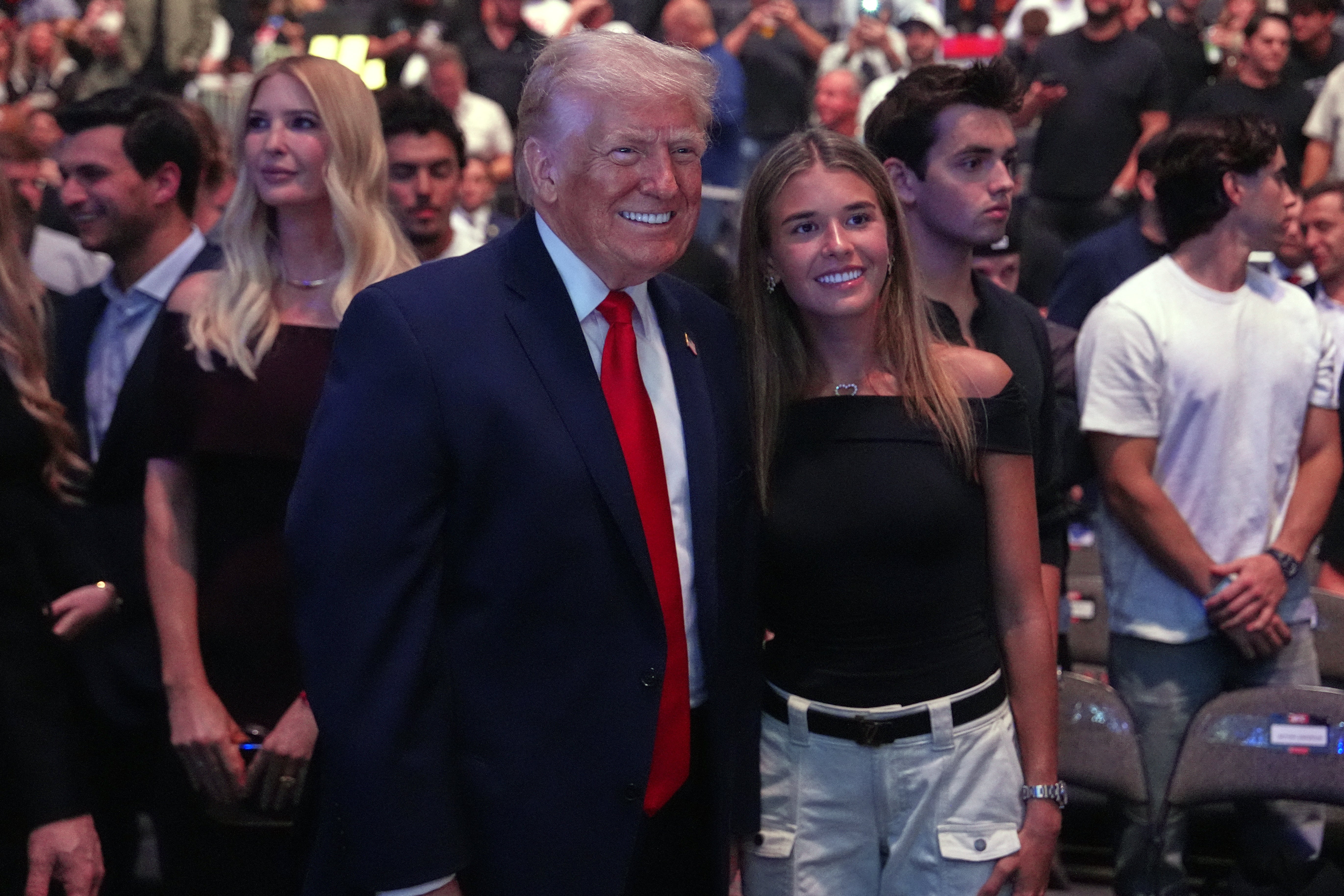 Kai Trump alongside her grandfather Donald Trump