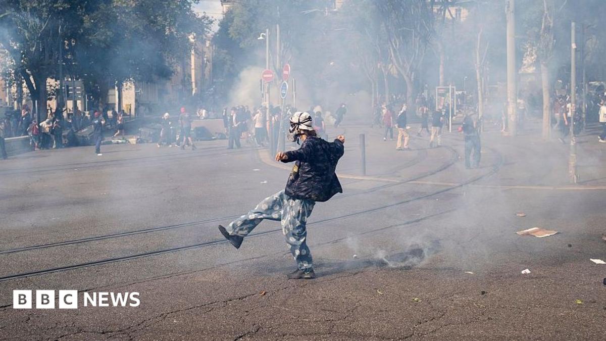 France school protests: Police fire tear gas at crowds as officer charged over student hit by projectile