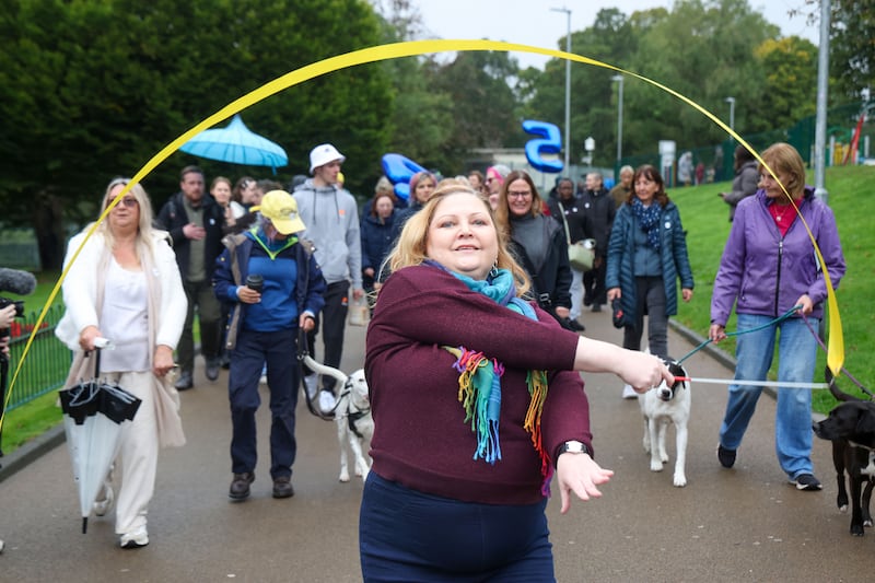 Local people take part in walk prior to the unveiling of New Script for Mental Health’s new Give 5 installation bench in the Falls Park in west Belfast as part of Féile na Carraige 2026. PICTURE: MAL MCCANN