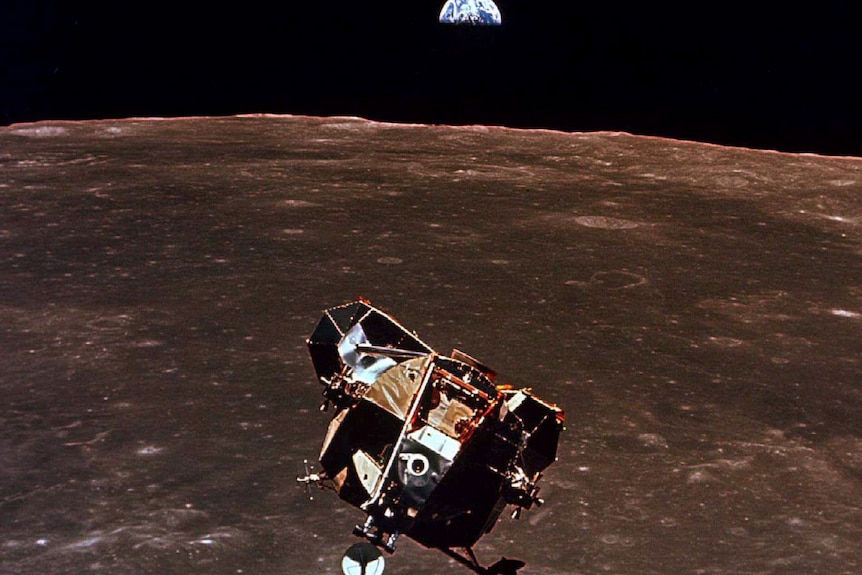 A module on the moon looks back at the Earth.