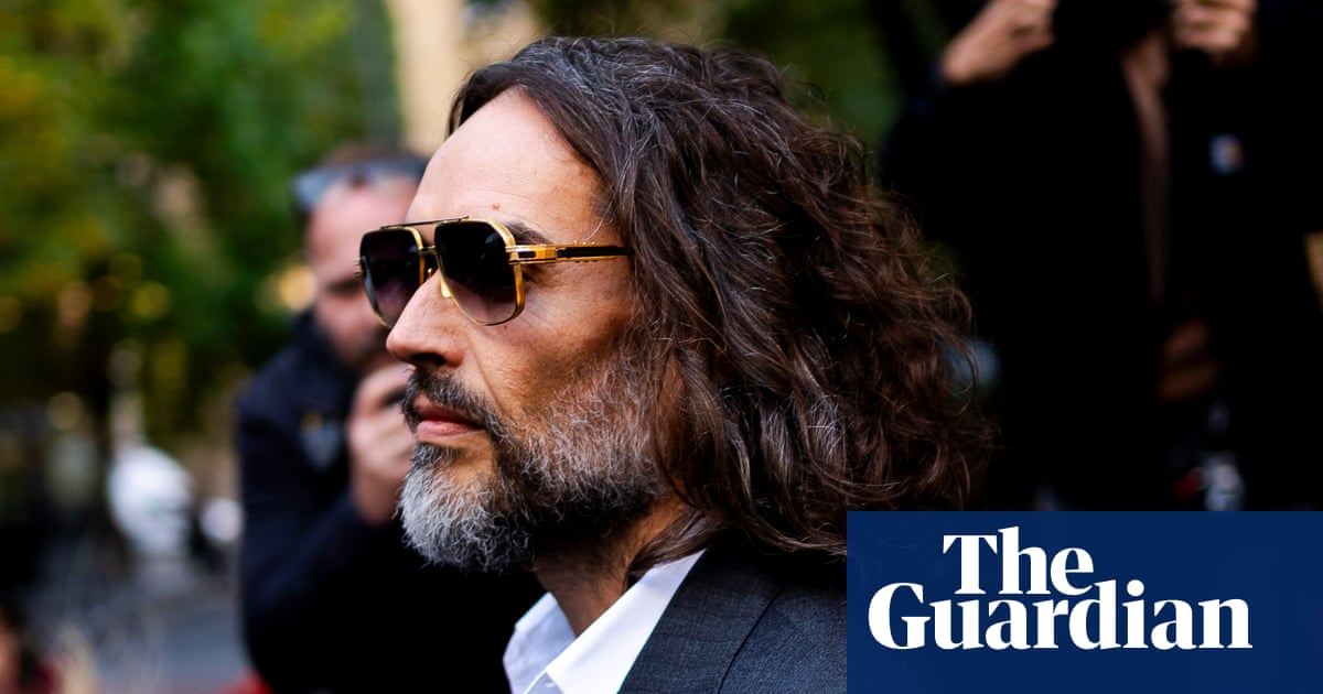 Russell Brand was ‘wild-eyed maniac’ when trying to drag woman into toilets, court told | UK news
