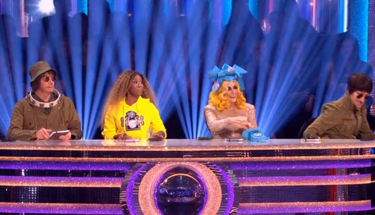 The judging panel in their fancy dress