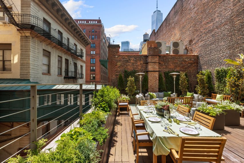 Roof terrace refurbished with planters and outdoor furniture
