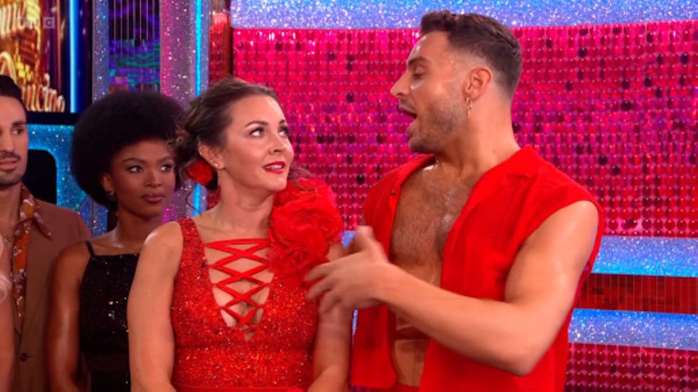 strictly come dancing lacey vito people in colorful outfits on a sparkly stage.