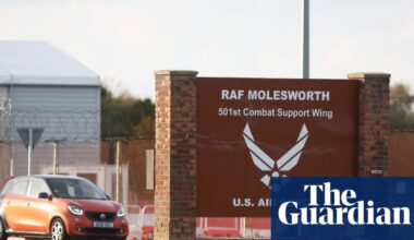 Two Latvians arrested at RAF base in Cambridgeshire released on bail | UK news