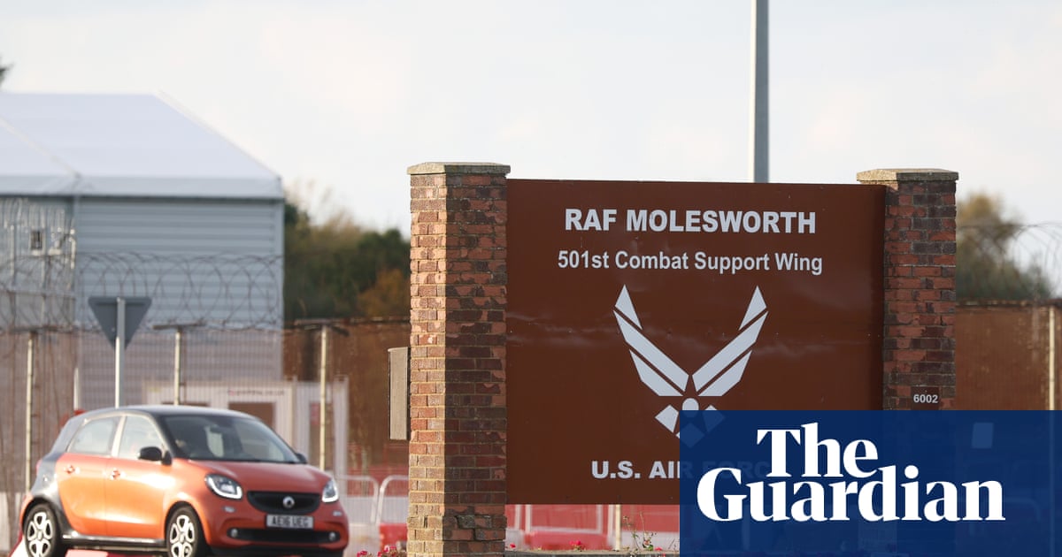 Two Latvians arrested at RAF base in Cambridgeshire released on bail | UK news