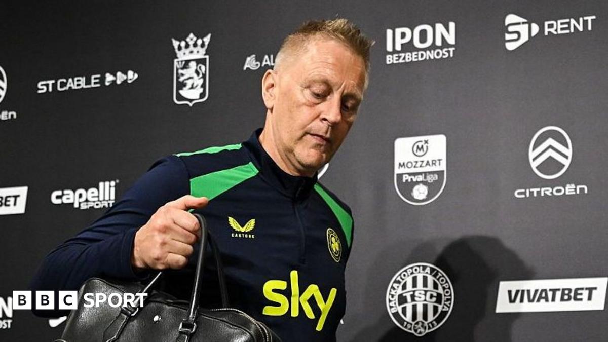 Heimir Hallgrimsson leaves the news conference room