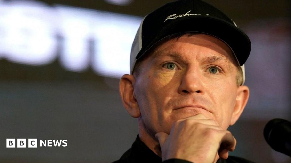 A headshot image of Ricky Hatton, wearing a black and white cap, at a pre-fight boxing press conference