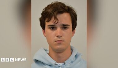 Stanislav Carpiuc wearing a grey hoodie in his mug shot
