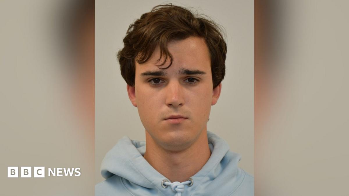 Stanislav Carpiuc wearing a grey hoodie in his mug shot