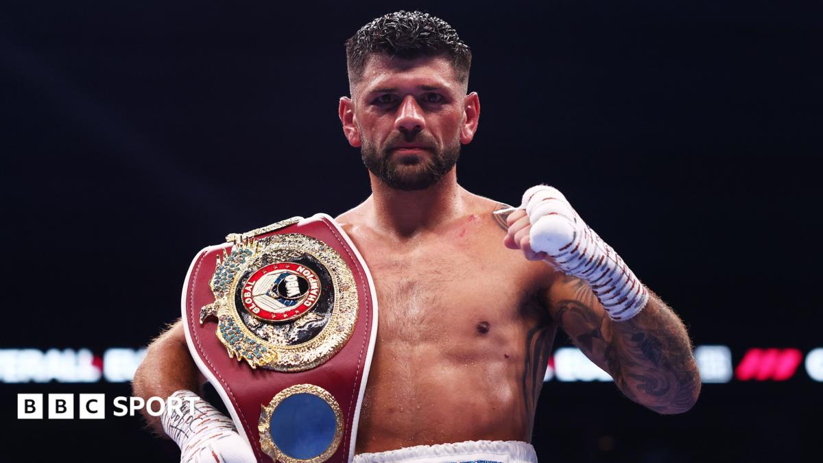 Joe Cordina celebrates with world title belt