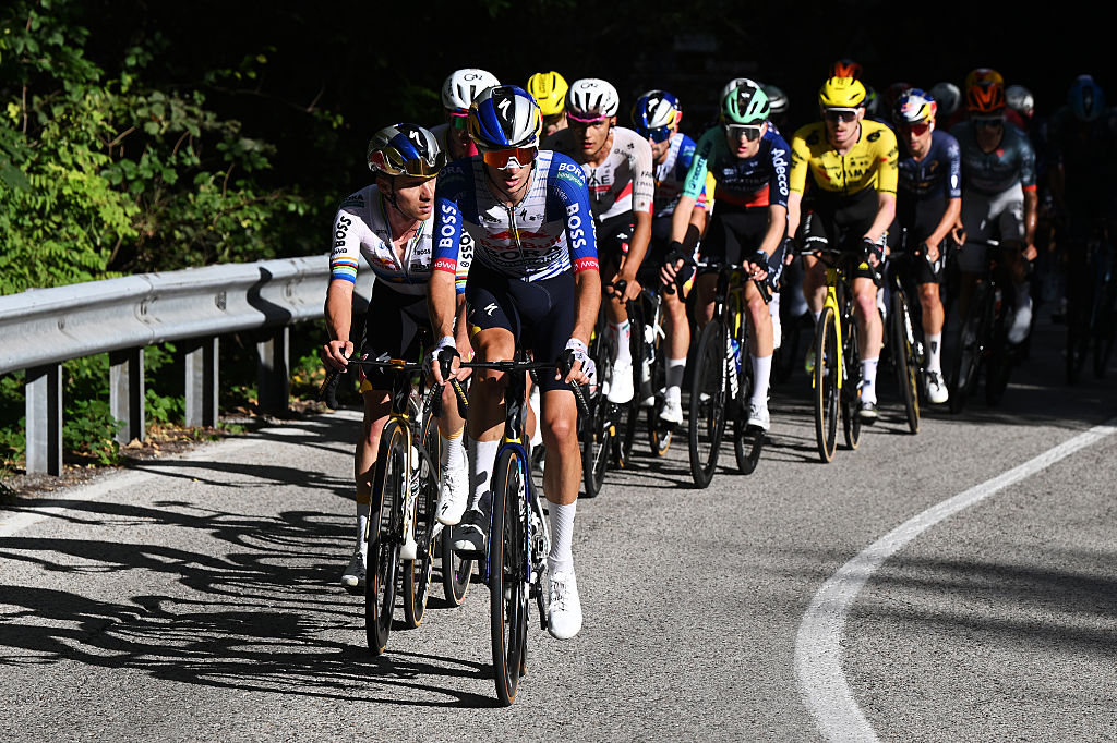 COMO, ITALY - OCTOBER 10: (L-R) Remco Evenepoel of Belgium and Giulio Pellizzari of Italy and Team Red Bull - BORA - hansgrohe competes during the 120th Il Lombardia 2026 a 239km one day race from Bergamo to Como / #UCIWT / on October 10, 2026 in Como, Italy. (Photo by Dario Belingheri/Getty Images)