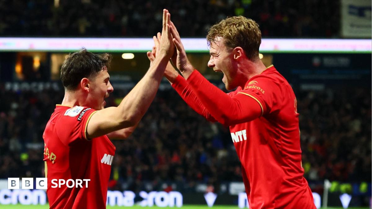 Will Lankshear (left) celebrates his first goal at Bolton with Tommy Conway