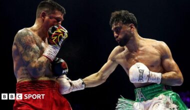 Adam Azim lands a punch on Steve Claggett