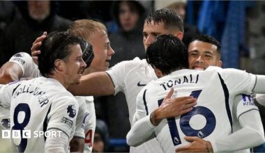 Sandro Tonali hugs a member of De Zerbi's coaching staff