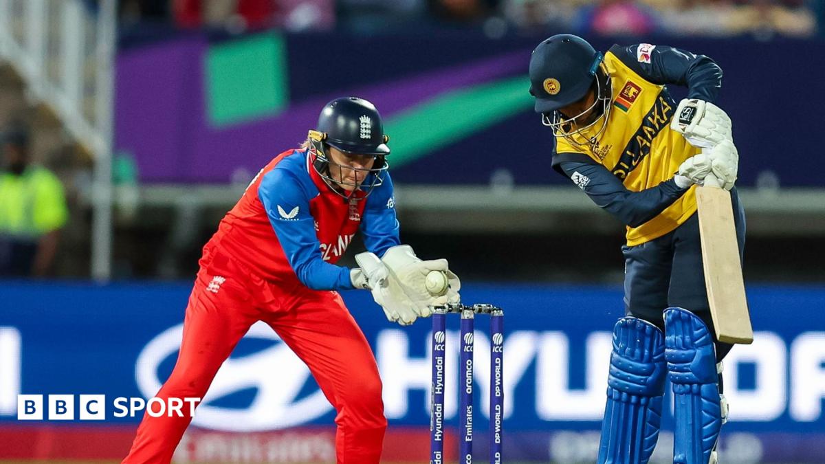 England wicketkeeper Amy Jones catches the ball as Sri Lanka batter Malki Madara plays and misses in a T20 World Cup match in 2024