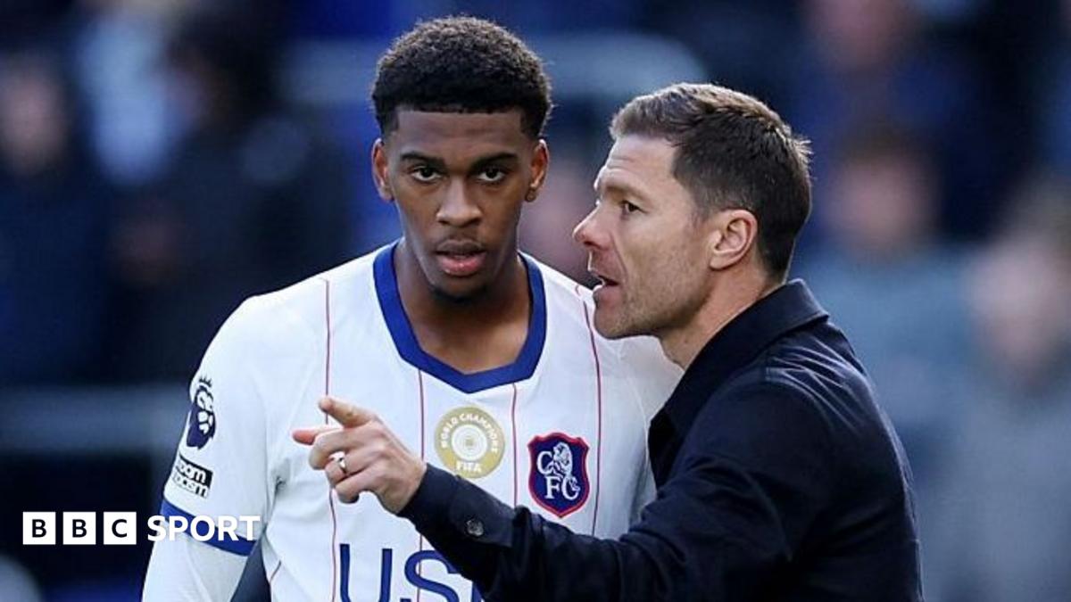 Josh Acheampong speaking to manager Xabi Alonso