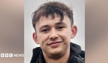Murdo Morrison is a young man with dark hair it is wear a dark hooded top and jacket.