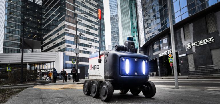 A food delivery robot by Russian technology giant Yandex makes its way in the Moscow International Business Centre in western Moscow on January 13, 2025 [File: Alexander Nemenov/AFP]
