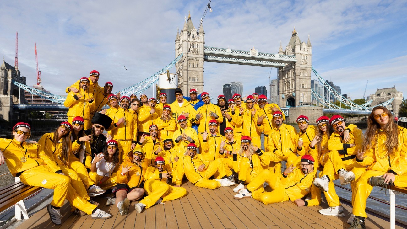 Ali G and look-alikes pose in London