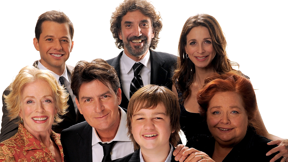 "Two and a Half Men" cast members Holland Taylor, Jon Cryer, Charlie Sheen, Marin Hinkle, Angus T. Jones and Conchata Ferrell pose with creator Chuck Lorre at the 35th Annual People’s Choice Awards on Jan. 7, 2009, in Los Angeles, Calif.