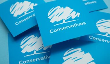 Conservative United Kingdom political party logo against a blue background