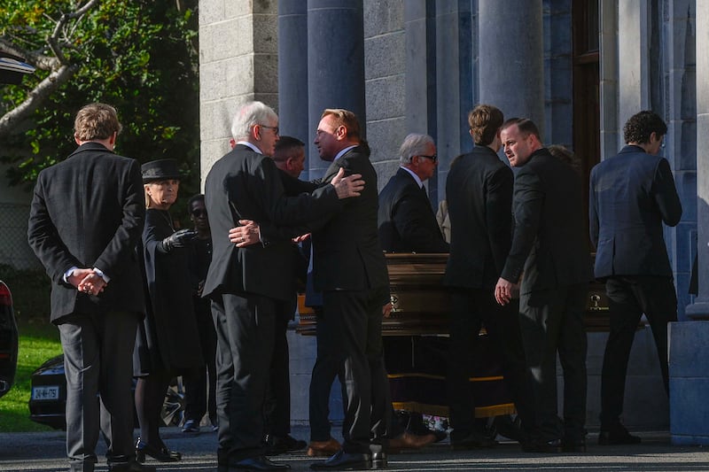 Michael Flatley (centre) greets a mourner at the funeral of his wife Niamh O'Brien at the Church Of St Therese, Mount Merrion, near Dublin. Photograph: Mark Marlow/PA Wire