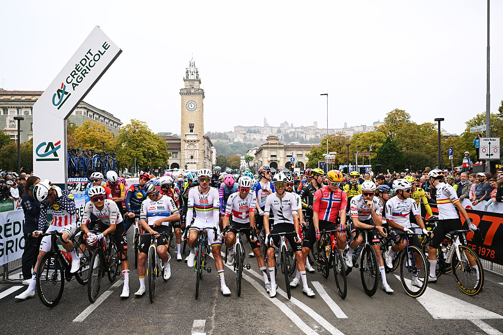 BERGAMO, ITALY - OCTOBER 10: (L-R) Quinn Simmons of United States and Team Lidl - Trek, Isaac Del Toro of Mexico and UAE Team Emirates - XRG, Remco Evenepoel of Belgium and Team Red Bull - BORA - hansgrohe, Brandon McNulty of United States - World Champion Jersey, Jan Christen of Switzerland and UAE Team Emirates - XRG, George Bennett of New Zealand and Team NSN Cycling, Anders Skaarseth of Norway and Team Uno-X Mobility, Michael Gogl of Austria and Team Alpecin - Premier Tech, Vicente Rojas of Chile and Team Bardiani CSF 7 Saber, Marcel Camprubi of Spain and Team Pinarello Q36.5 Pro Cycling Team and a general view of the peloton prior to the 120th Il Lombardia 2026 a 239km from / #UCIWT / Bergamo to Como on October 10, 2026 in Bergamo, Italy. (Photo by Dario Belingheri/Getty Images)