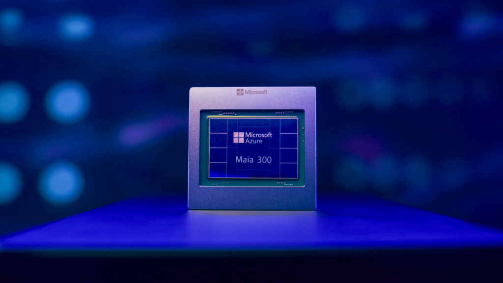 Microsoft Azure Maia 300 chip displayed against a dark blue background, illuminated by blue and purple light.