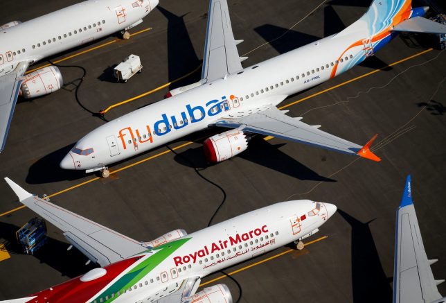 FILE PHOTO: Grounded flydubai and Royal Air Maroc Boeing 737 MAX aircraft are seen parked in an aerial photo at Boeing Field in Seattle, Washington, U.S. July 1, 2019. Picture taken July 1, 2019. REUTERS/Lindsey Wasson/File Photo