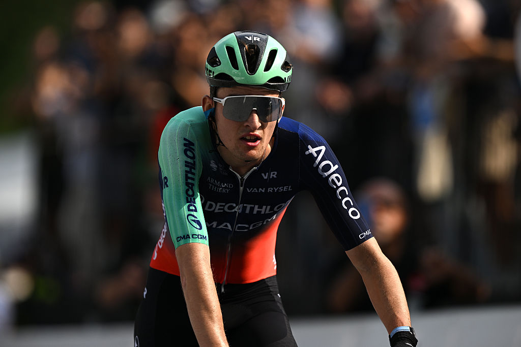Paul Seixas of France and Team Decathlon CMA CGM Team crosses the finish line as second place winner during the 15th Grand Prix Cycliste de Montreal
