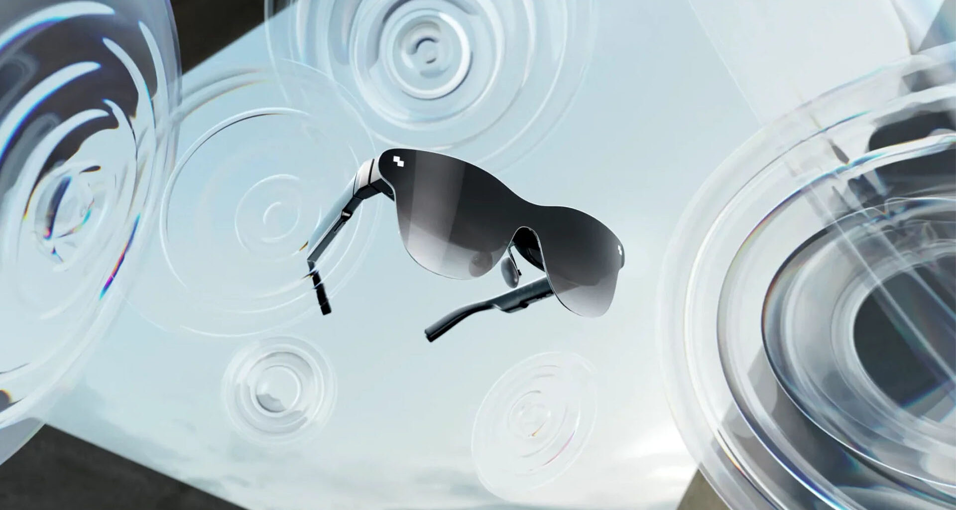 A pair of black smart glasses with mirrored lenses, surrounded by circular lens elements in a futuristic setting.