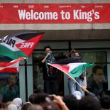LONDON, ENGLAND - OCTOBER 7: Protesters speak during a demonstration outside King's College London on October 7, 2025 in London, England. On the same day as people mark the second anniversary of the Hamas attacks on Israel which led to more than 1200 deaths and 251 hostages taken, students from King's College London, London School of Economics, University College London, and School of Oriental and ??African Studies (SOAS) take part in a march through central London to mark two years since 'the beginning of the genocide in Gaza'. This march comes as Home Secretary Shabana Mahmood announced increased police powers at repeat protests, such as those in support of Palestine. (Photo by Dan Kitwood/Getty Images)