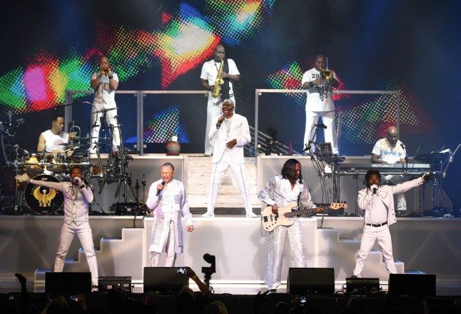 ALPHARETTA, GA - AUGUST 19: John Paris, B. David Whitworth, Robert Burns, Ralph Johnson, Gary Bias, Verdine White, Reggie Young, Philip Bailey, Jr., and Myron McKinley of Earth Wind And Fire perform at Verizon Wireless Amphitheater on August 19, 2017 in Alpharetta, Georgia. (Photo by Chris McKay/Getty Images)