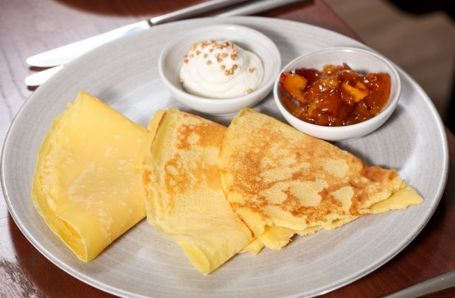 Science writer Clare Wilson trying food created with novel crops including Lupin Flour at the Blue Room Restaurant at University of Southampton. Pancakes made with Lupin Flour.