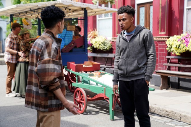 Denzel Danes and Nugget Gulati in the market in EastEnders