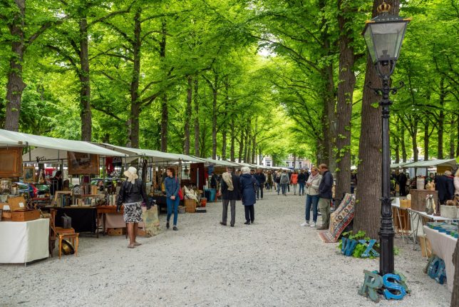 25 May 2019, Hague, the Netherlands: Every second Saturday on the Lange Voorhout square a book and antique market takes place. Mostly second hand object are being sold to the many visitors. This picture is from that market on a cool Saturday morning in May