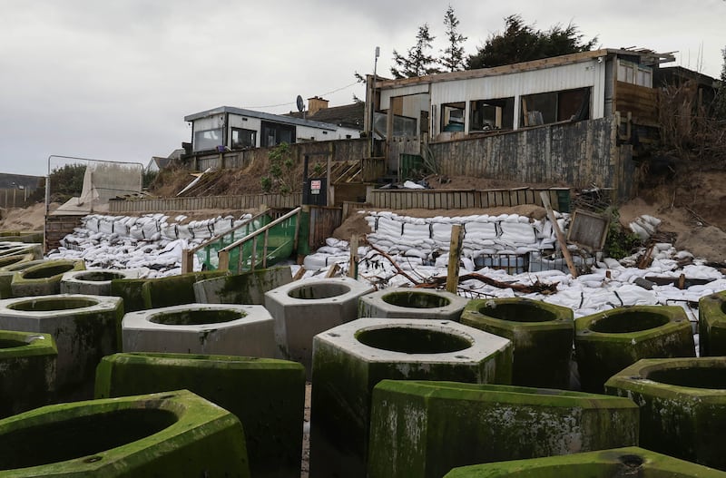 A property that has been gradually eroding into the sea on Portrane beach, Co Dublin. Photograph: Colin Keegan/Collins