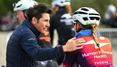 Giorgia Bronzini speaking with a rider while working with Human Powered Health