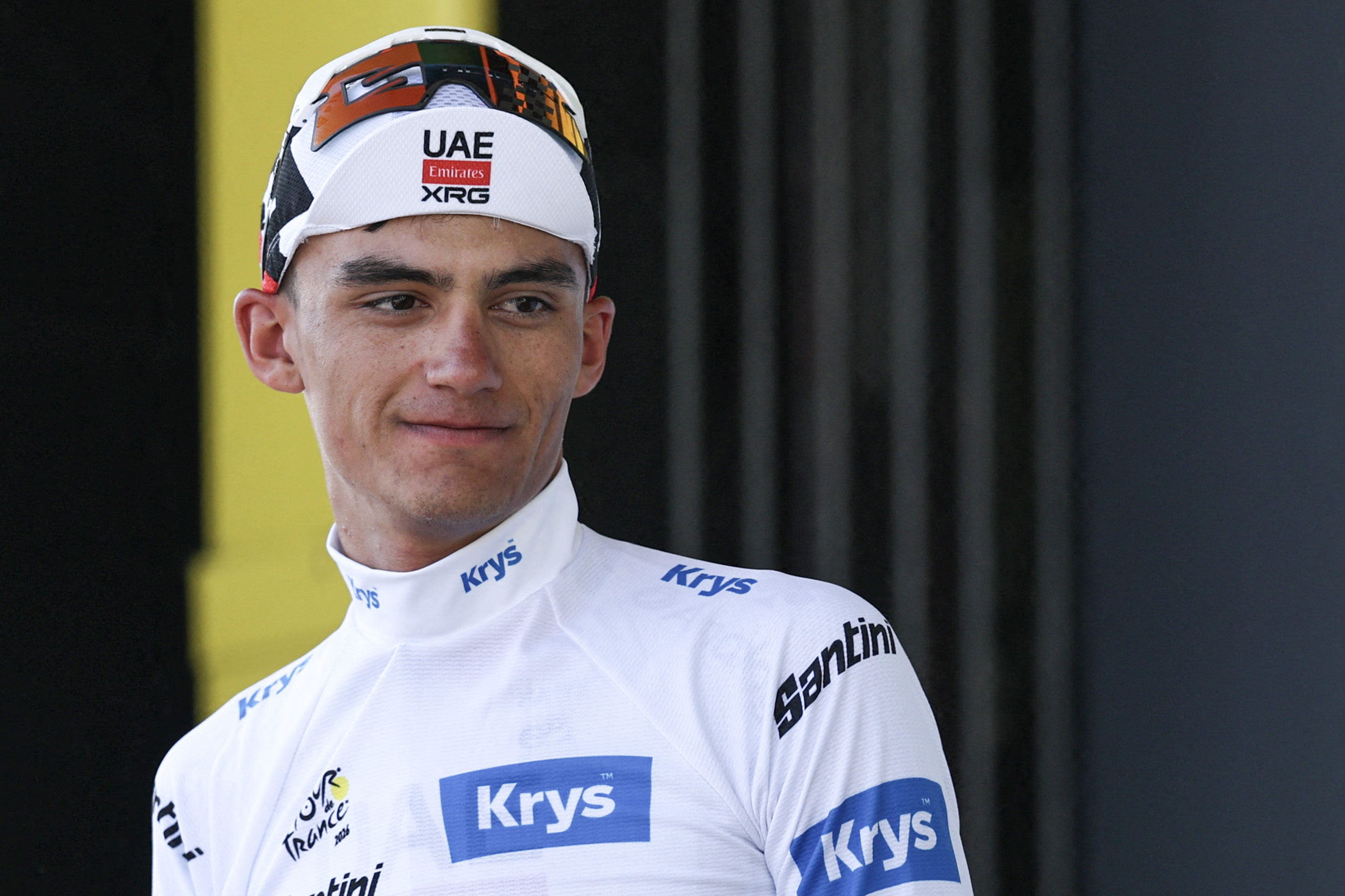 UAE Team Emirates - XRG's Mexican rider Isaac Del Toro celebrates on the podium with the best young rider's white jersey after the 8th stage of the 113th edition of the Tour de France cycling race, 182 km between P&eacute;rigueux and Bergerac in southwestern France, on July 11, 2026. (Photo by Anne-Christine POUJOULAT / AFP via Getty Images)