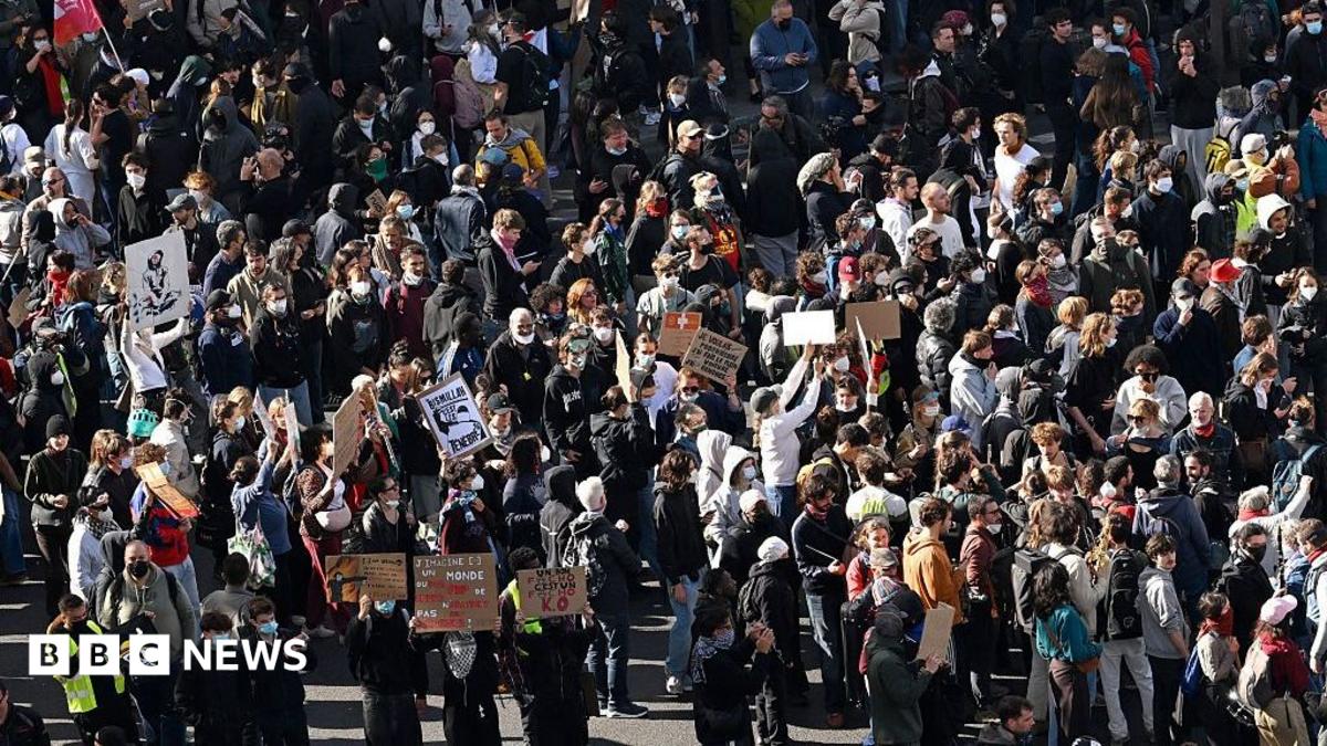 Major protest march held in Paris as more than 160 arrested across France - follow live