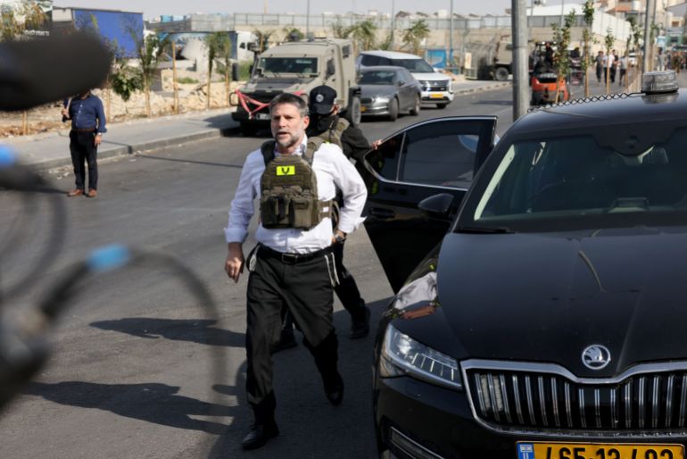 Far-right Israeli Finance Minister Bezalel Smotrich visits the scene of an earlier fire exchange between armed Palestinians and Israeli forces following an incident at the norther checkpoint of Hebron in the Israeli-occupied West Bank on October 23, 2026.