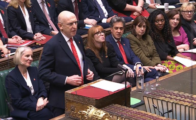 This video grab taken from footage broadcast by the UK Parliamentary Recording Unit (PRU) via the Parliament TV website on October 28, 2026 shows Britain’s Chancellor of the Exchequer John Healey as he presents the budget in the House of Commons in London [AFP]