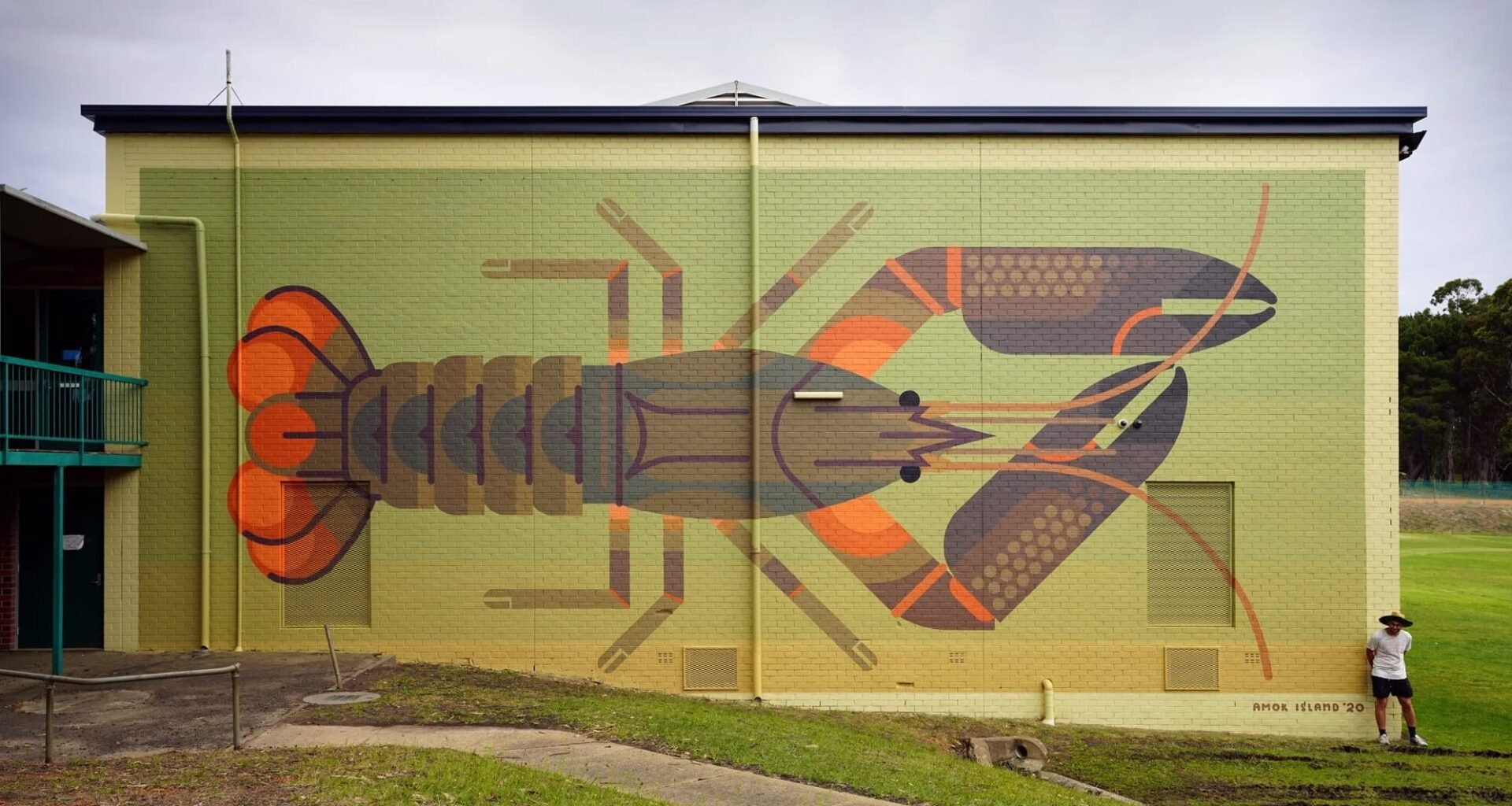 a bright geometric mural of a lobster