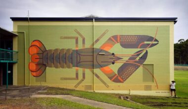 a bright geometric mural of a lobster