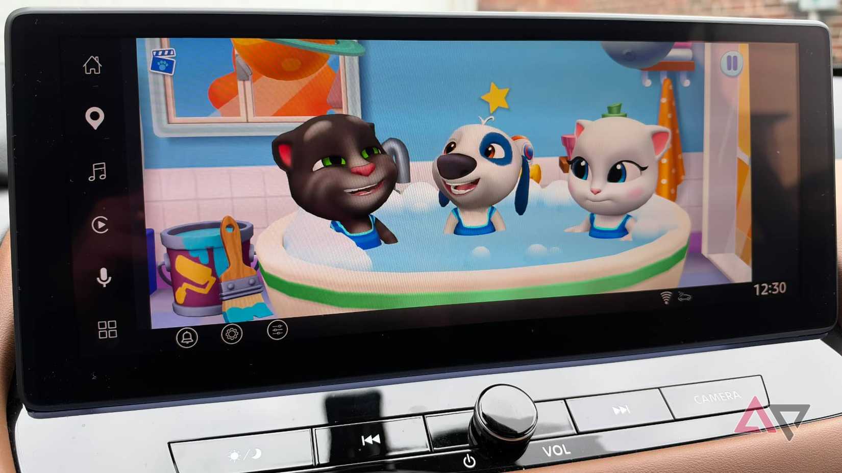 A car dashboard infotainment screen showing My Talking Tom Friends