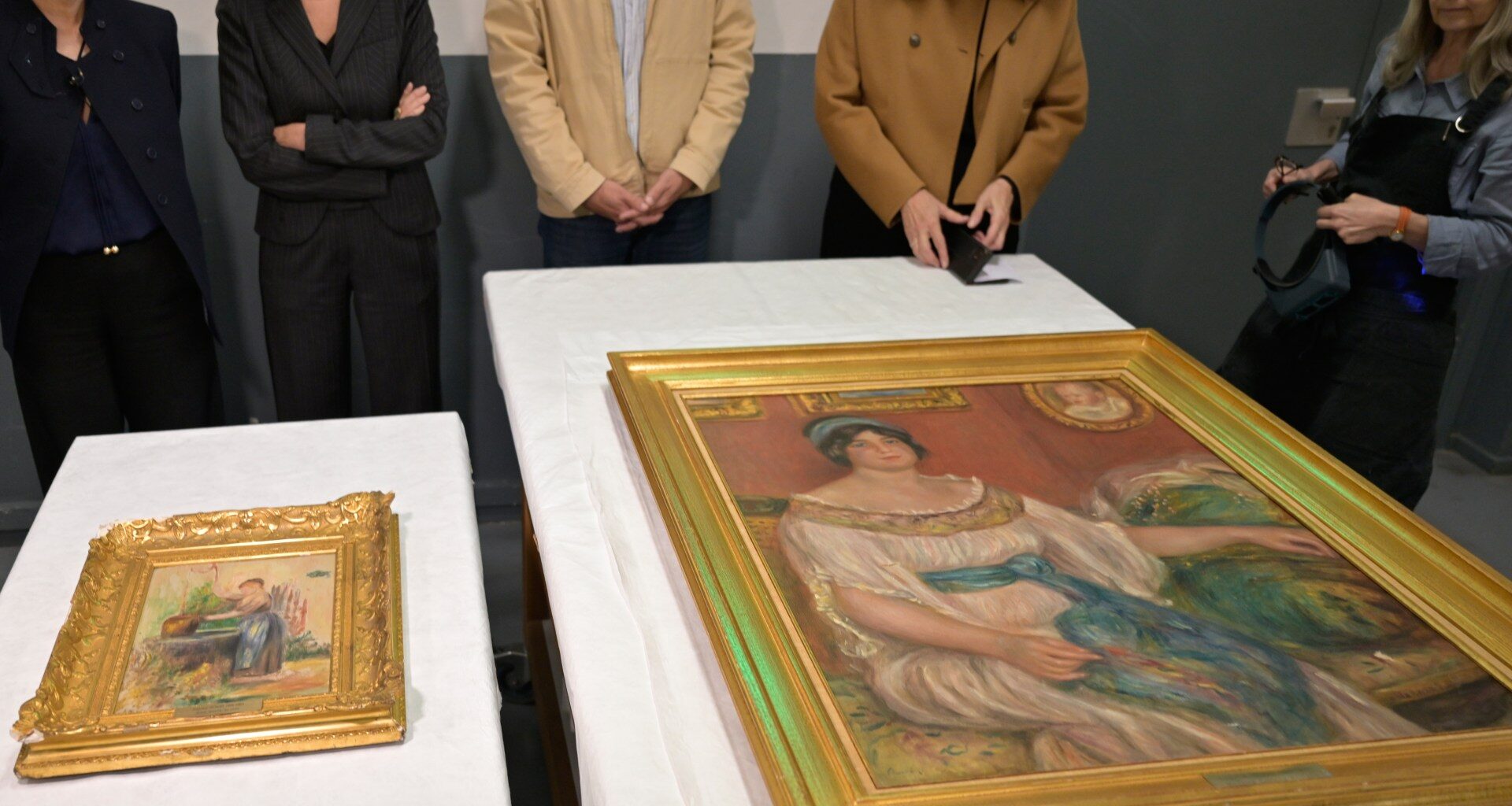 Stolen Renoir paintings found behind wall in France following arrests | Arts and Culture News