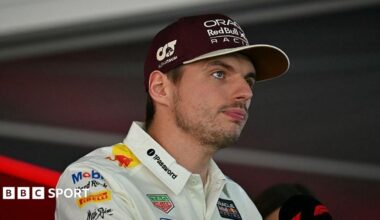 Max Verstappen answers questions in the media pen in Austin