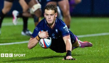Edinburgh scrum-half Hector Patterson dives over the line to score a try against Lions in the United Rugby Championship