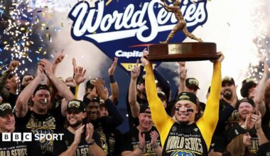 William Contreras lifts the Willie Mays World Series Most Valuable Player award after the Milwaukee Brewers beat the Tampa Bay Rays in game five to clinch the 2026 World Series